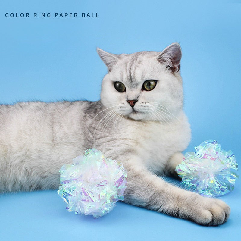 This Colorful Noise-making Paper Ball Cat Toy Is A Great Way To Keep Your Cat Entertained And Amused. It's A Self-playing Toy That Comes In A White Co